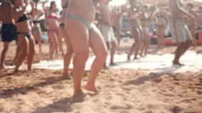 4k video of beach party at sea. Happy cheerful people dancing and having fun