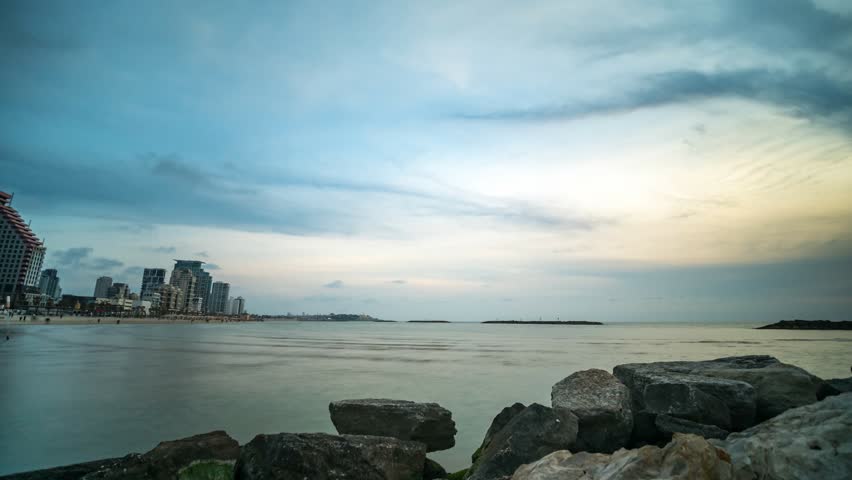 Time Lapse of Sunset Over a Tel Aviv Beach in Summer	
