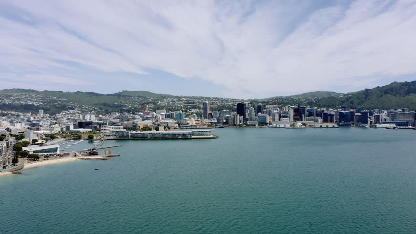 Aerial of Wellington city and Harbour during a lovely sunny day in New Zealand with a beautiful cloud formation