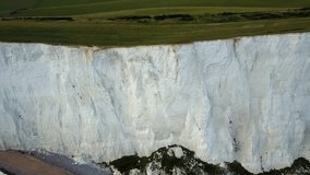 Aerial video of white chalk cliffs, Beachy Head, UK