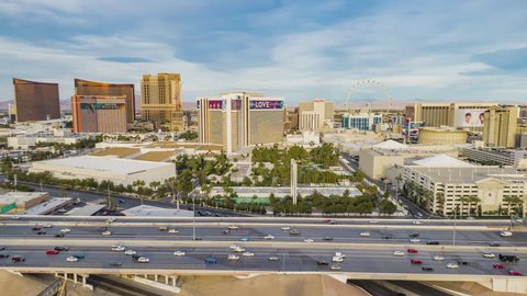 Las Vegas, Nevada / USA - April 10th 2019: Aerial view of Las Vegas, Nevada hotels and casinos on the strip from above with freeway traffic and ferris wheel below