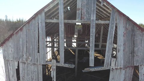 Drone footage inside of the rafter of an old barn in Canada.