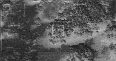Drone with thermal night vision camera view of soldiers walking during war