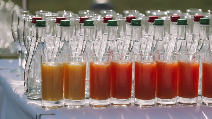Juices In Glasses. Mineral Water On The Table Party Or Wedding Reception.