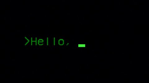 Typing the classical programmers' greeting phrase, Hello World, on a computer terminal. Green characters, black background, clear big font.