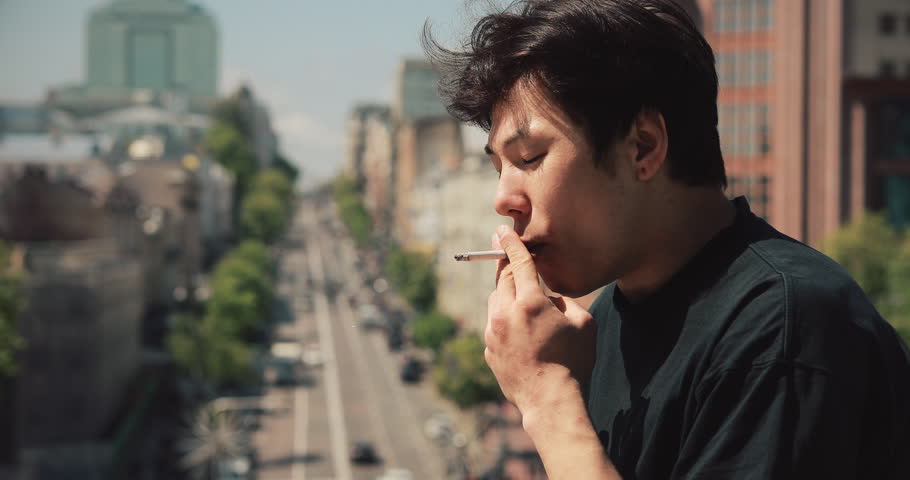 Asian Man Smoking Cigarette in Stock Footage Video (100% Royalty-free)  1028850968 | Shutterstock