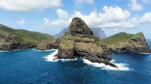Stunning aerial 4k drone footage of Mount Eliza and North Beach on Lord Howe Island, a pacific subtropical island in the Tasman Sea between Australia and New Zealand. Mount Gower in the background.