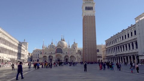 VENICE, ITALY – OCTOBER 25, 2017: Vertical pan shot of the Campanile San Marco  in Venice.
