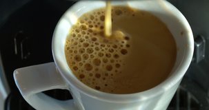 Machine Coffee Pouring Into Mug In Slow Motion