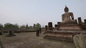 4K video of Mahathat temple in Sukhothai historical park, Thailand.