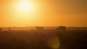 Glitch effect. Sunset over the industrial city. Sun close-up. Karaganda, Kazakhstan. Time Lapse - Powered by Shutterstock - Get 15% off with code: PIKWIZARD15