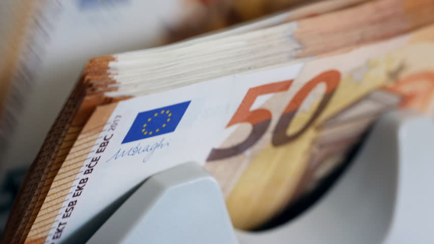 Close up of euro banknotes while being counted
