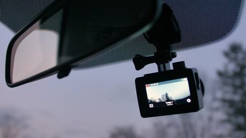 Dashcam Recording Road in Front of Driving Vehicle in the Evening