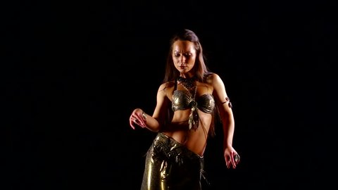 Dancer black background belly Dance. Beautiful belly dancer dancing ethnic dances in sexy traditional dress