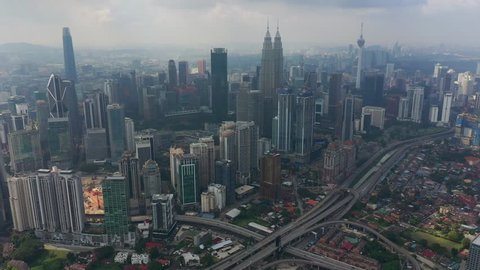sunny day flight over kuala lumpur city downtown traffic road jam aerial panorama 4k malaysia