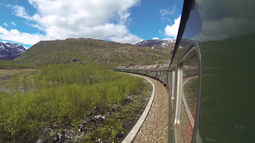 View of Flamsbana Rail Car (Flam Train) Curving Around Breathtaking Mountains in Norway Royalty-Free Stock Footage #1028935487