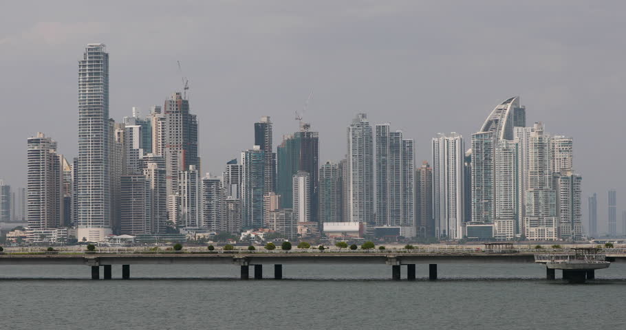 Panama City urban downtown skyscrapers bridge. Banking, commerce, and tourism economy. Busy urban center.