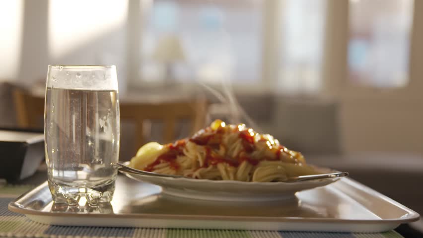
Spaghetti plate in sunshine in evening | Shutterstock HD Video #1028986469