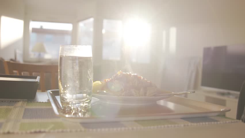 Plate of spaghetti and sunshine through window | Shutterstock HD Video #1028986499