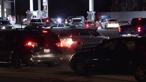 Toronto, Ontario, Canada May 2019 Cars lined up at gas pumps for cheap gasoline at night