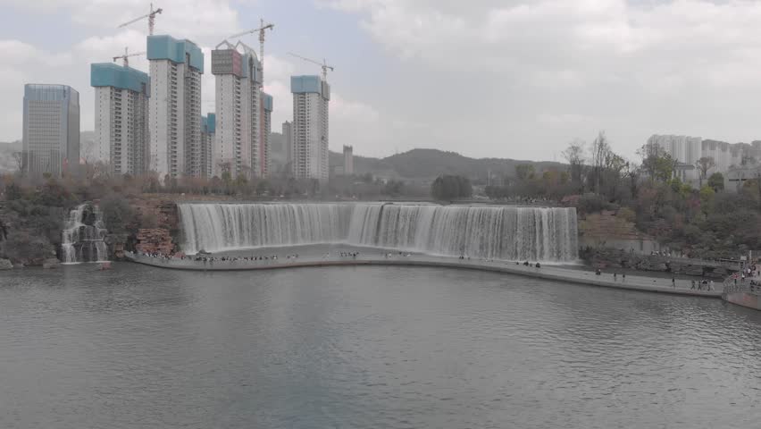 Aerial drone Footage of Kunming Waterfall Park the largest waterfall park in Asia in Kunming, China