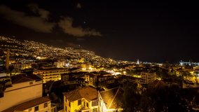 Beautiful 4K UHD timelapse video of the skyline cityscape of the city Funchal on the island Madeira at sunrise in summer