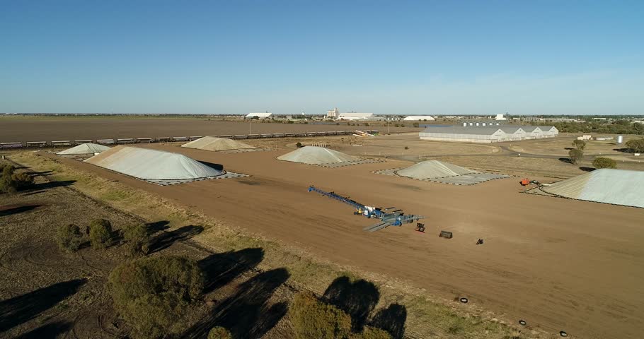 Flat agricultural bulk storage site for processing of grain crops in rural area around Moree town, NSW, Australia.
