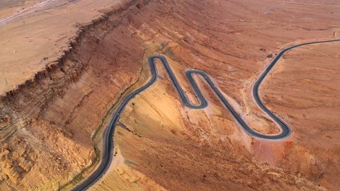 Aerial: Long Curves of a Road in the Desert in Negev Desert, Israel