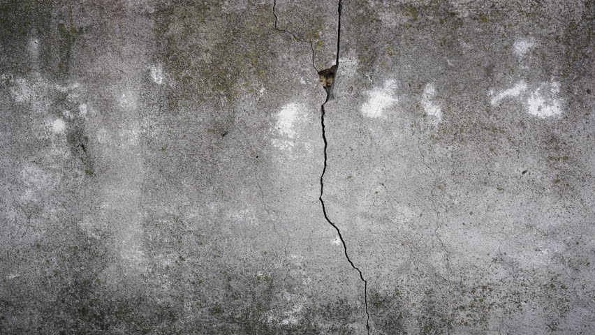4K. Concrete real dirty wall. Seamless texture. Grunge grey background pattern. Cement and sand cracked wall of tone vintage for backdrop or decoration. Graffiti wall.  | Shutterstock HD Video #1029052778