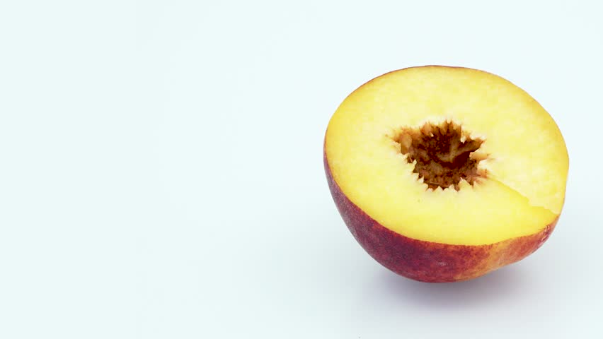 Peach half without seed frame right in 4k 3840 x 2160 Rotating Loop-able 360 Degree Rotation
