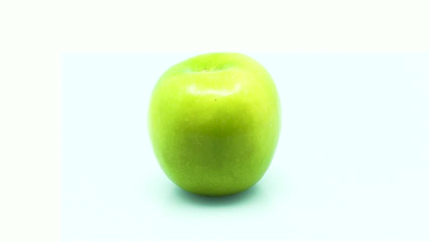 Granny smith apple center screen in 4k 3840 x 2160 Rotating Loop-able 360 Degree Rotation