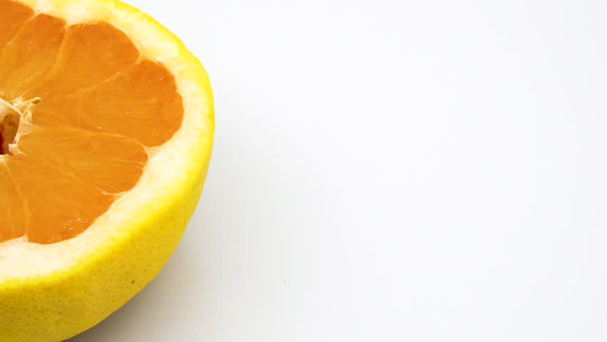 Home Grown Pink Grapefruit Frame Left in 4k 3840 x 2160 Rotating, Looping, 360 Degree Rotation on White Background
