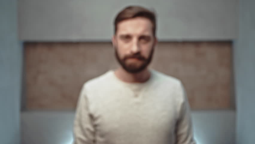 Portrait view of man touching empty virtual glass