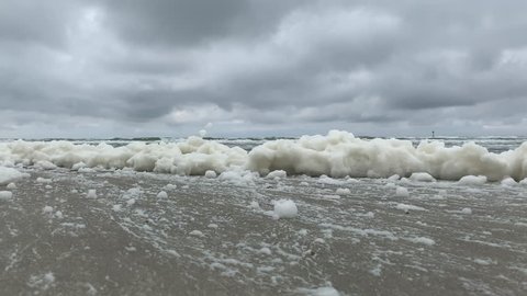 Sea foam blowing in the wind