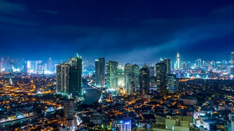 MANILA, PHILIPPINES - CIRCA MARCH 2018: Time-lapse view on the skyline of Makati circa March, 2018 in Manila, Philippines.
