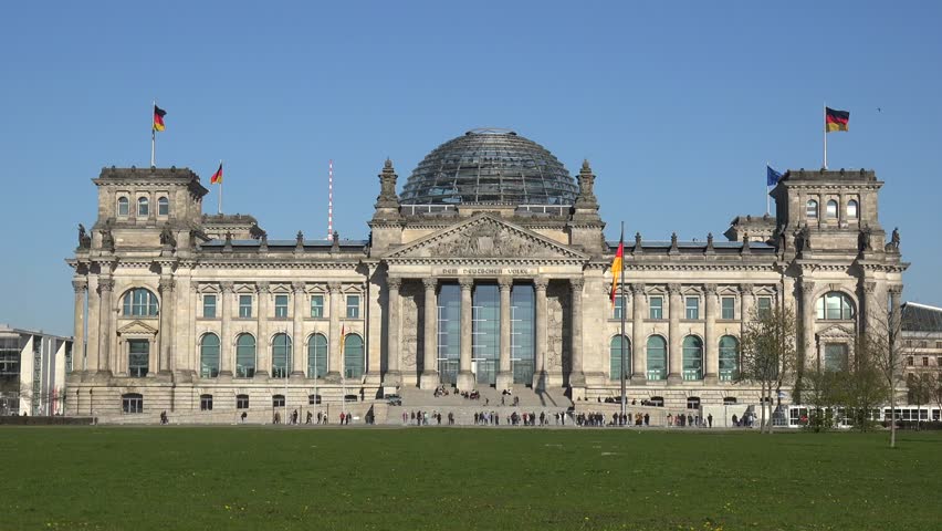 BERLIN/Germany, Reichstag entrance inscription, sculptures, and German Flag on the front, Federal Republic of Germany,

