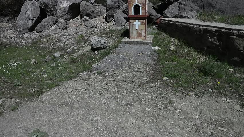 A small chapel. A mountain appears in background, Grevena, Greece.