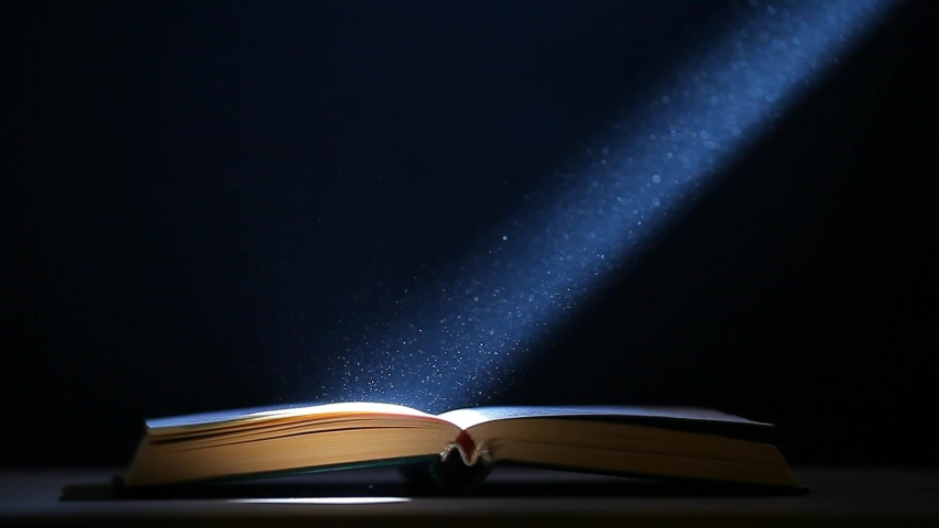 footage of book table dust dark background 