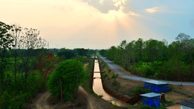 4K timelapse video of irrigation canal in the evening, Thailand.