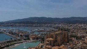 Aerial video footage of palma de mallorca cathedral. Spain island culture. Drone view