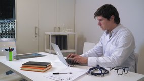 Doctor working on computer. HD video prores