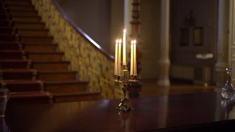 Candlestick Burning at the Victorian Mansion Table in Dark Candles Flaming in Night Video