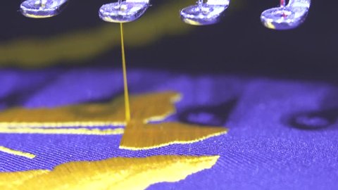 Close-up needle of Computerized machine embroidery , Industrial Sewing , embroidery machine close up shot
