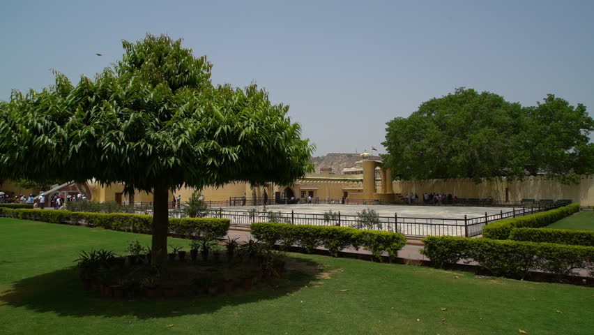 With several of the instruments in view. Jaipur, Rajasthan, India. Visitors explore the site. Handheld. Wide shot. WS