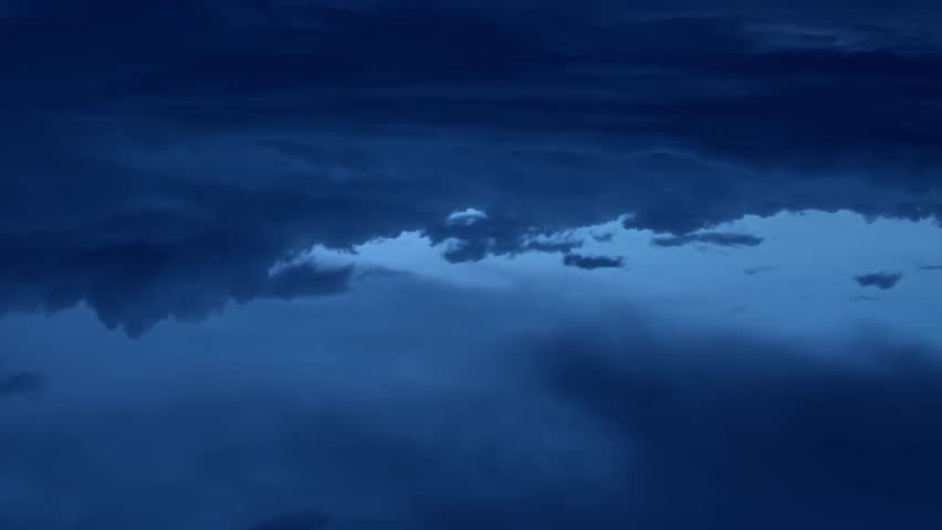 Dark rainy clouds time lapse, nature big building, formating fast moving away in horizone, beautiful clear, realxing sky panoramic view.