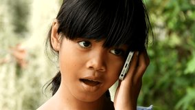 Asian young girl calling smartphone concept,girl using smartphone,technology idea clips