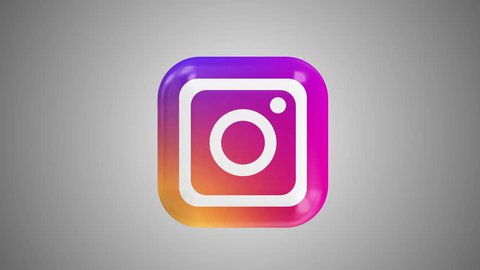 Kiev, Ukraine - May 8, 2019: Instagram logo icon loop rotation animation on gradient background. Instagram - free application for sharing photos and videos online