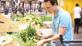 people buying fresh local bio vegetables in grocery store or supermarket