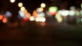 bokeh blur video of vehicles moving on road