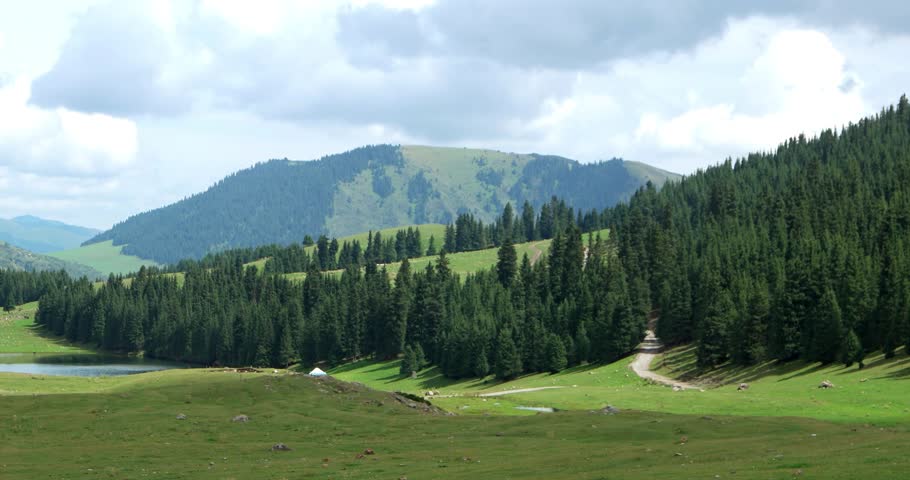 Glitch effect. Lake in the mountains. Chon-Ak-Suu. Grigoriev Gorge. Issyk Kul. Kyrgyzstan